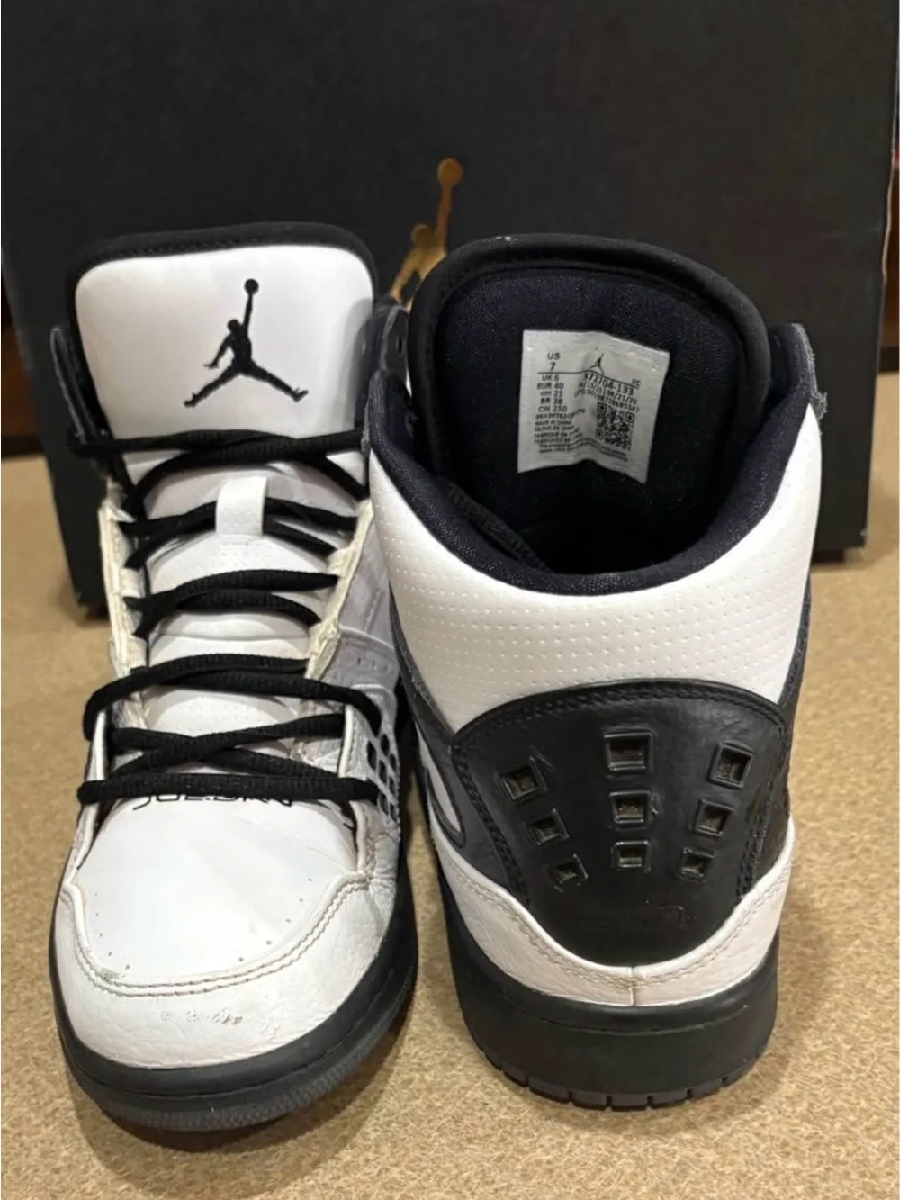 Jordan Men’s White and Black High-Top Sneakers